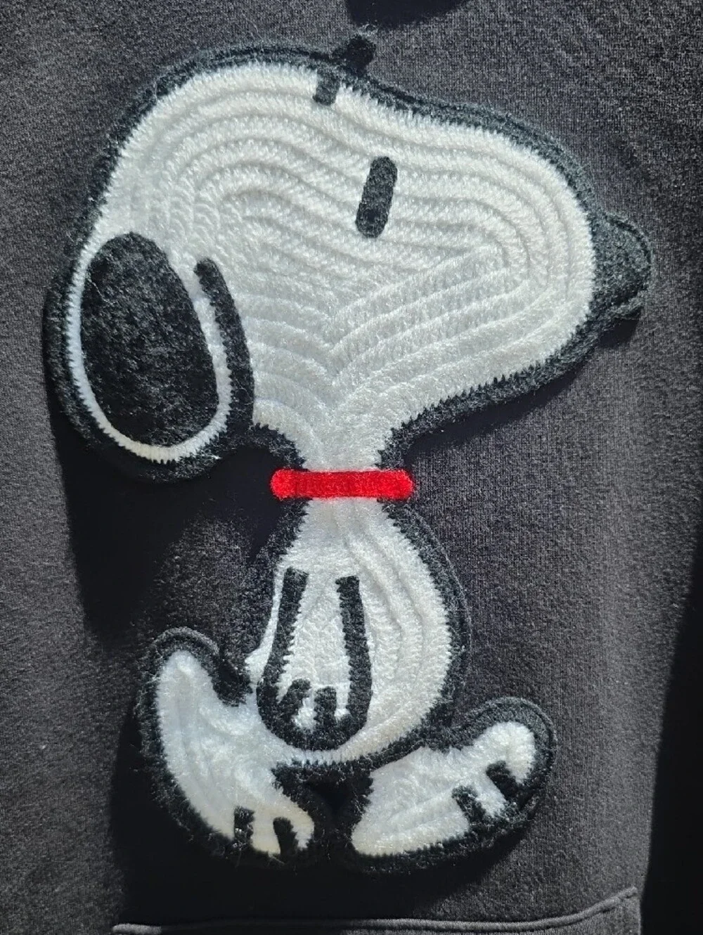 Peanuts Black Hoodie with Snoopy Patch and Red Collar Accent